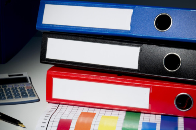 Multicolored binders in stack: SBDPro Business Articles Blog