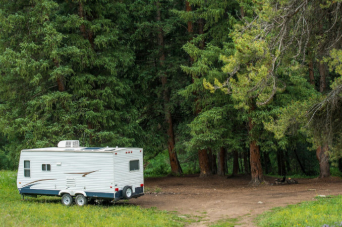 camper van boondocking in forest: SBDPro Automotive Articles