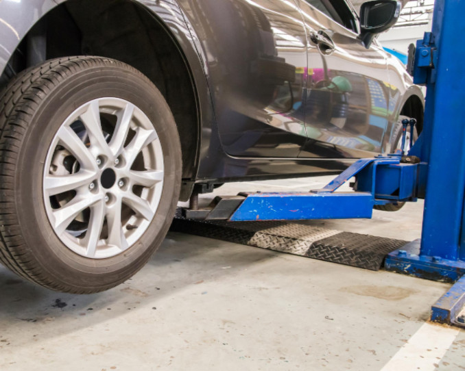 mechanic rotating tires, SBDPro Automotive Article