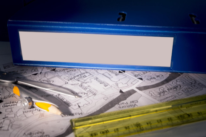 blue binder on desk: SBDPro Blog