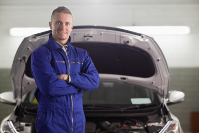 Mechanic with open hood: SBDPro Automotive Blog