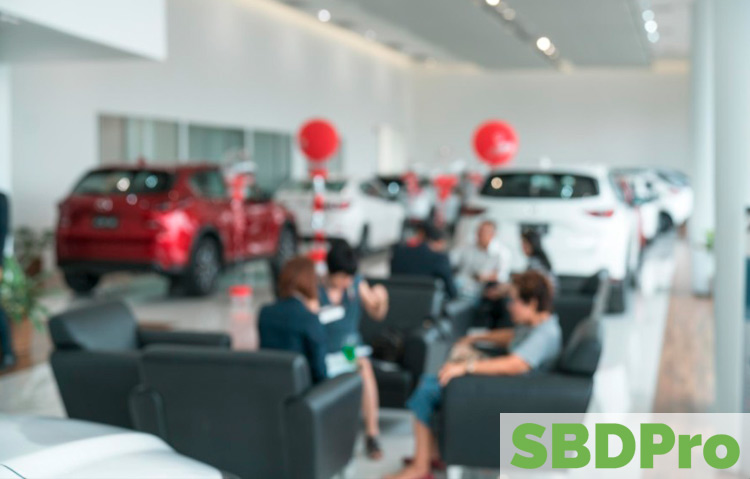 Image of the inside of a car dealership lobby