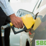 Person pumping gas